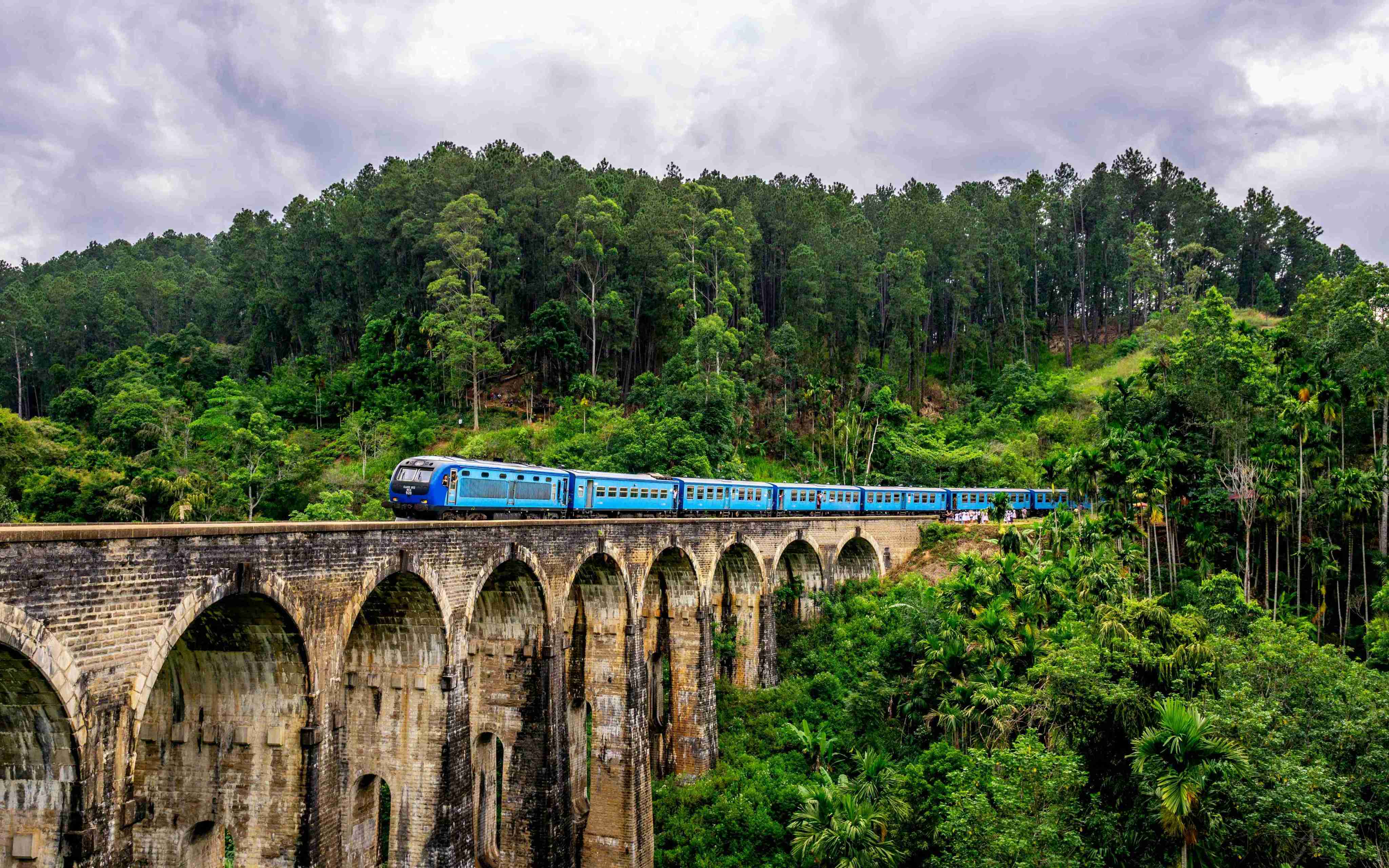 Luxury scenic train journey across Nine Arches Bridge Sri Lanka